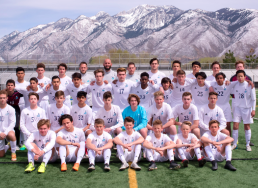 Dado with the JDCHS soccer team.