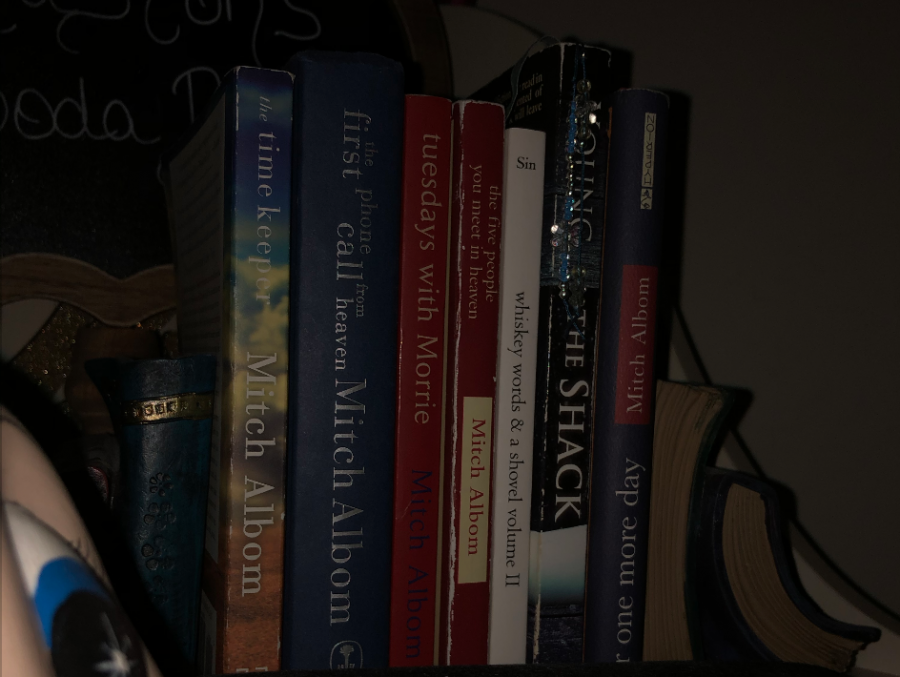 This is a picture of my bookshelf where I leave a special place for Mitch Albom.
