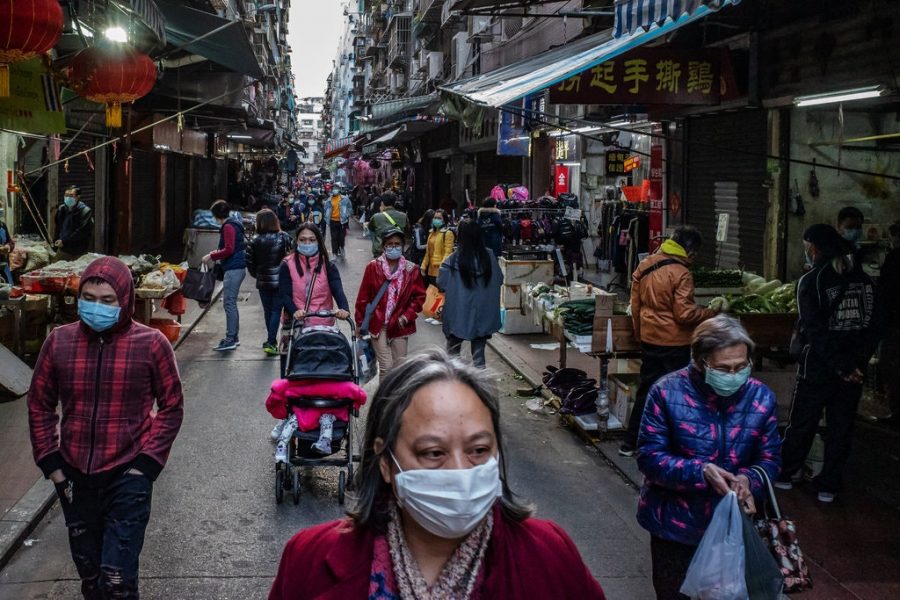 People fill the streets of Macau, China, donning face masks to protect from the spreading Coronavirus. 