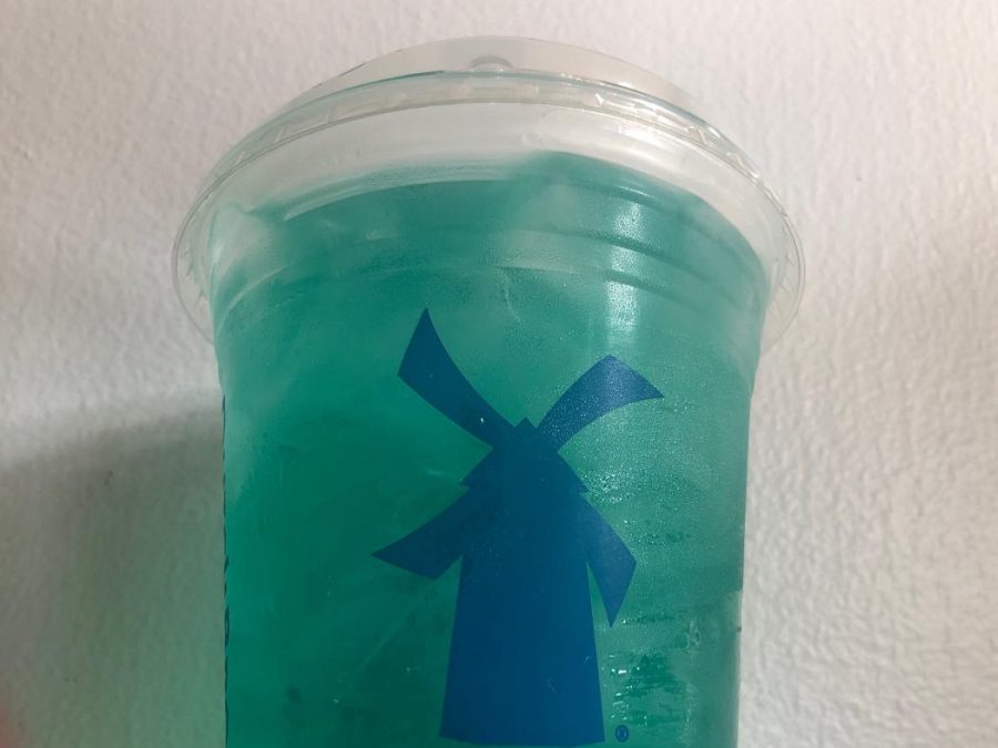 Dutch Bros electric berry iced lemonade with lime and blue raspberry flavoring.